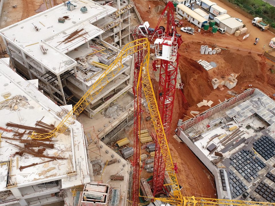 Aerial view of collapsed tower crane on a building site